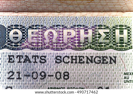Schengen visa of Greece on the page of the passport, close up

