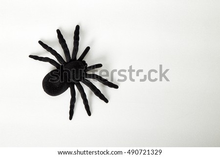black spider toy isolated on white. Comic horror for Halloween,