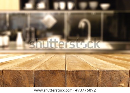 interior of kitchen with wooden table of free space 