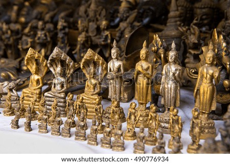 Golden buddha doll for souvenir in myanmar