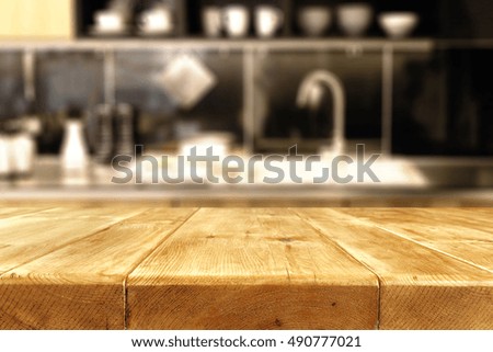 interior of kitchen with wooden table of free space 