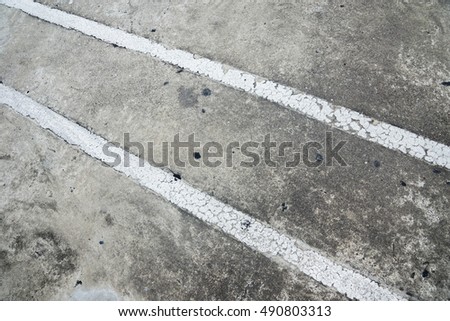 Old Concrete floor with White traffic line