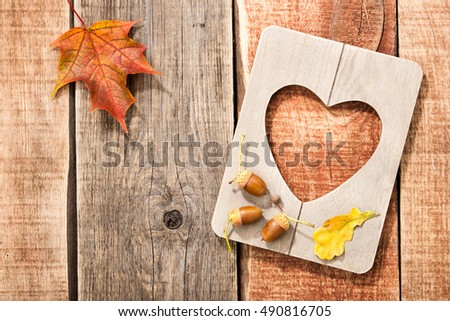 Autumn background with frame heart shaped