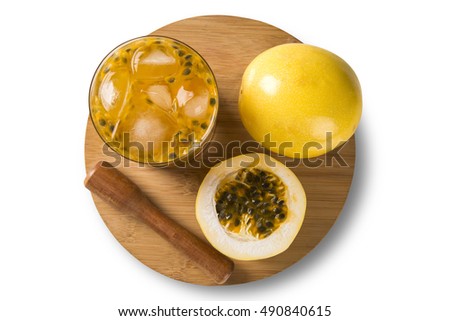 Fresh drink made with passion fruit Caipirinha on white background