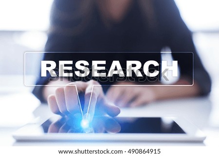 Woman is using tablet pc, pressing on virtual screen and selecting "Research".