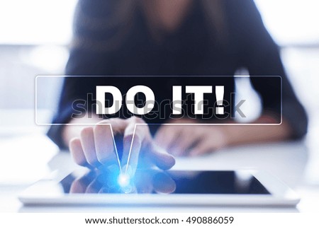 Woman is using tablet pc, pressing on virtual screen and selecting "Do it!".