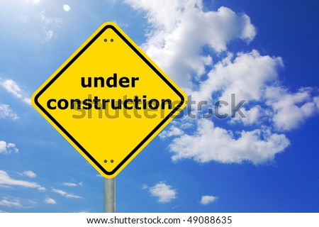 under construction sign and copyspace for a text message