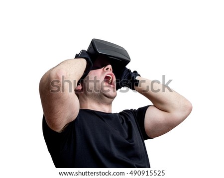 Man screaming using virtual reality headset isolated on white background. Technology immersion concept.