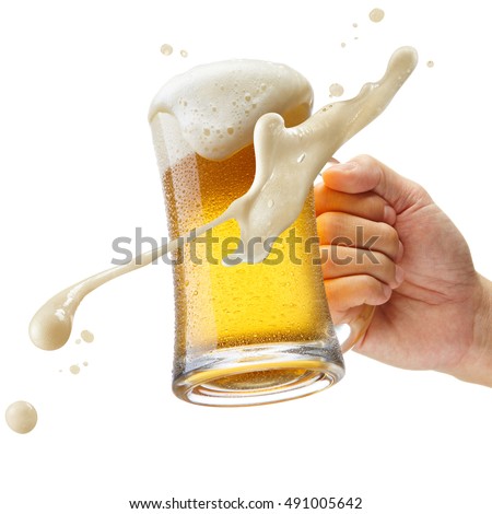 hand holding a mug of beer toasting Royalty-Free Stock Photo #491005642