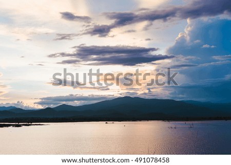 silhouette of sunset at lake