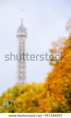 Blurred image of Paris in the autumn with Eiffel tower. 