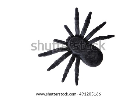 black spider toy isolated on white. Comic horror for Halloween.