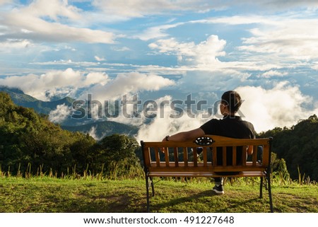 Travelers enjoy the view from Doi Inthanon viewpoint,chiang mai, thailand