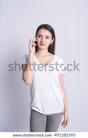 Beautiful woman talking to telephone
