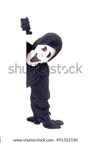 little girl dressed up for halloween isolated in white