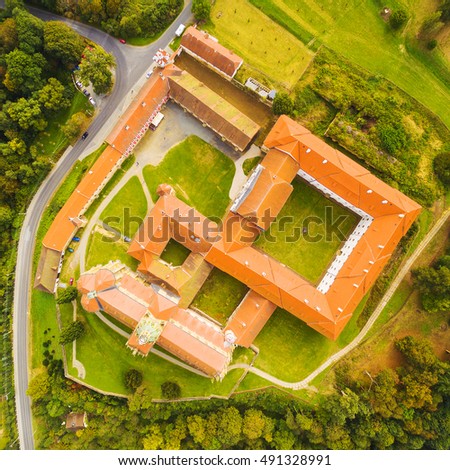 Aerial view of Benedictine monastery in Kladruby. Geometric pattern from baroque architecture. Landmarks from above. Czech Republic, Europe.