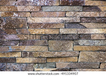 sample facing stones of different colors in stock close-up