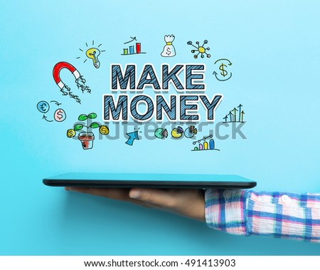 Make Money concept with a tablet on blue background