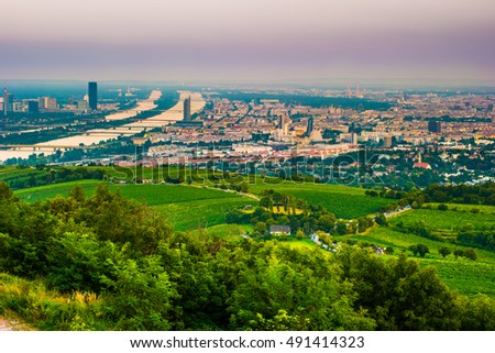 Beautiful view of skyline of Vienna and Danube River with green trees of Doebling district, Austria. Travel photo of the landmark.