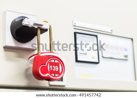 Lockout Tagout , Electrical safety system separated power or energy from electrician or worker. Royalty-Free Stock Photo #491457742