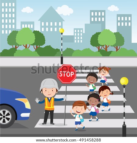 Traffic guard helping school kids crossing road by holding a stop sign