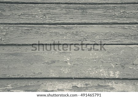 Old wooden texture background with horizontal lines.