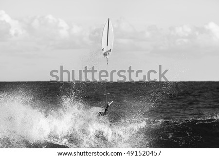 Black and white picture of a surfer at Tamarama beach