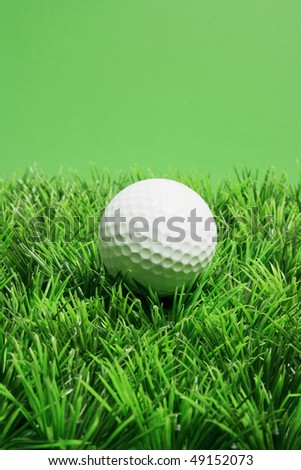 Golf Ball on Grass with Green Background