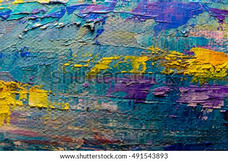 Abstract art background. Oil painting on canvas. Brown, green, blue and yellow texture. Fragment of artwork. Spots of oil paint. Brushstrokes of paint. Modern art. Contemporary art.