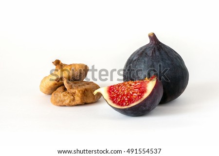 Isolated fresh figs fruit with dried sweet fruits. Nutrition meal on white background