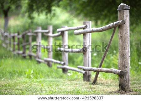 wooden fence in a summer Park