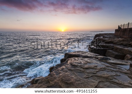 Sunrise from Amble on the north east coast of England, looking towards Coquet Island.
Amble, Northumberland, England, UK. Royalty-Free Stock Photo #491611255