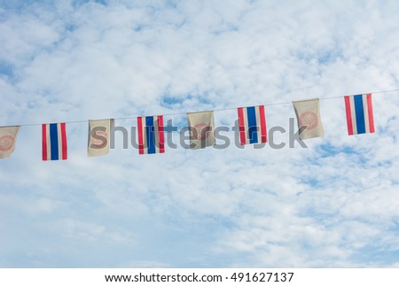 Thailand flags and Wheel of Dhamma flag in The sky
