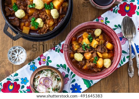 Hungarian goulash soup bograch close-up on the table. horizontal, top view. Royalty-Free Stock Photo #491645383