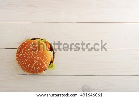 bbq hamburger with vegetables, spices on wooden white background. Top view with copy space for text menu