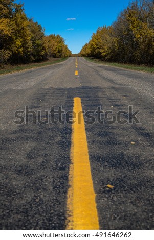Road Trip - rural highway in Canada during fall 