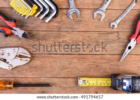 tools on wooden background