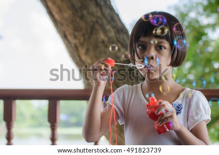 Asian Child Play Bubble