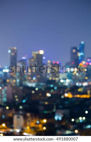 Night blurred lights, office building abstract background