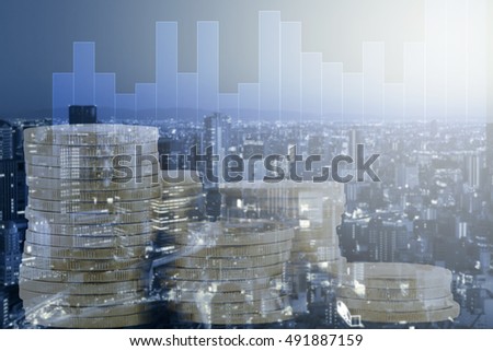 Double exposure pile money coin on city and trading graph