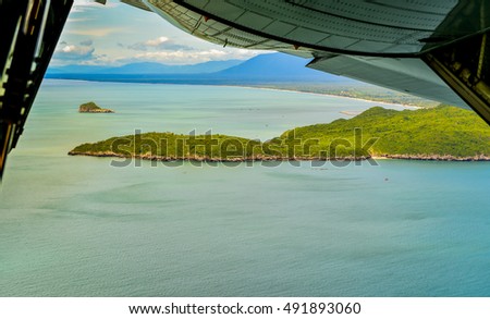 Bird's eye view, high-angle photos. Taken from the back door of a military transport aircraft, ocean, islands, mountains, sea, beach, nature, buildings, cities (top view of the most beautiful).
