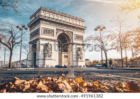 Arc de Triomphe located in Paris, in autumn scenery. Royalty-Free Stock Photo #491961382
