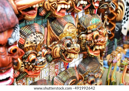 Typical souvenirs and handicrafts of Bali at the famous Ubud Market Royalty-Free Stock Photo #491992642
