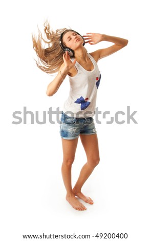 The young beautiful girl with headphones isolated on a white background