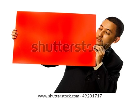 Business man hold a red blank sign isolated on white background. You can write your message on the red sign