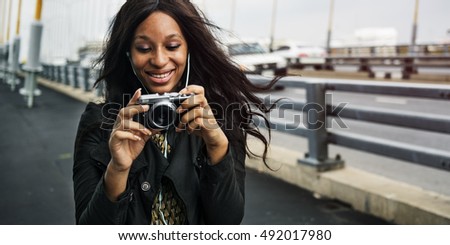 African Woman Listening Music Media Entertainment Camera Concept
