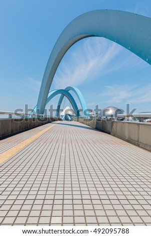 Modern bridge with bright sky blue background.