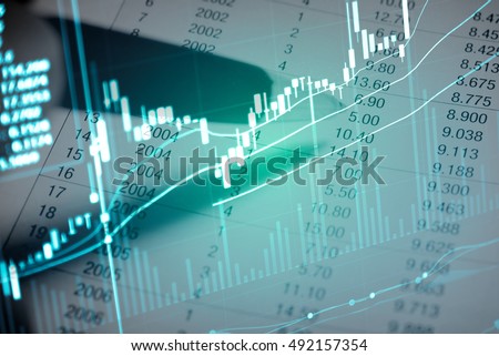 Double exposure of business working set with digital information show technical analysis via chart and graph as business concept.