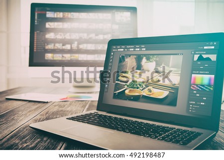photographer camera editor monitor design laptop photo screen photography - stock image