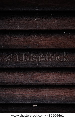 Portrait orientation pictures with beautiful wooden background with dark tones to bright contrasting advertising
